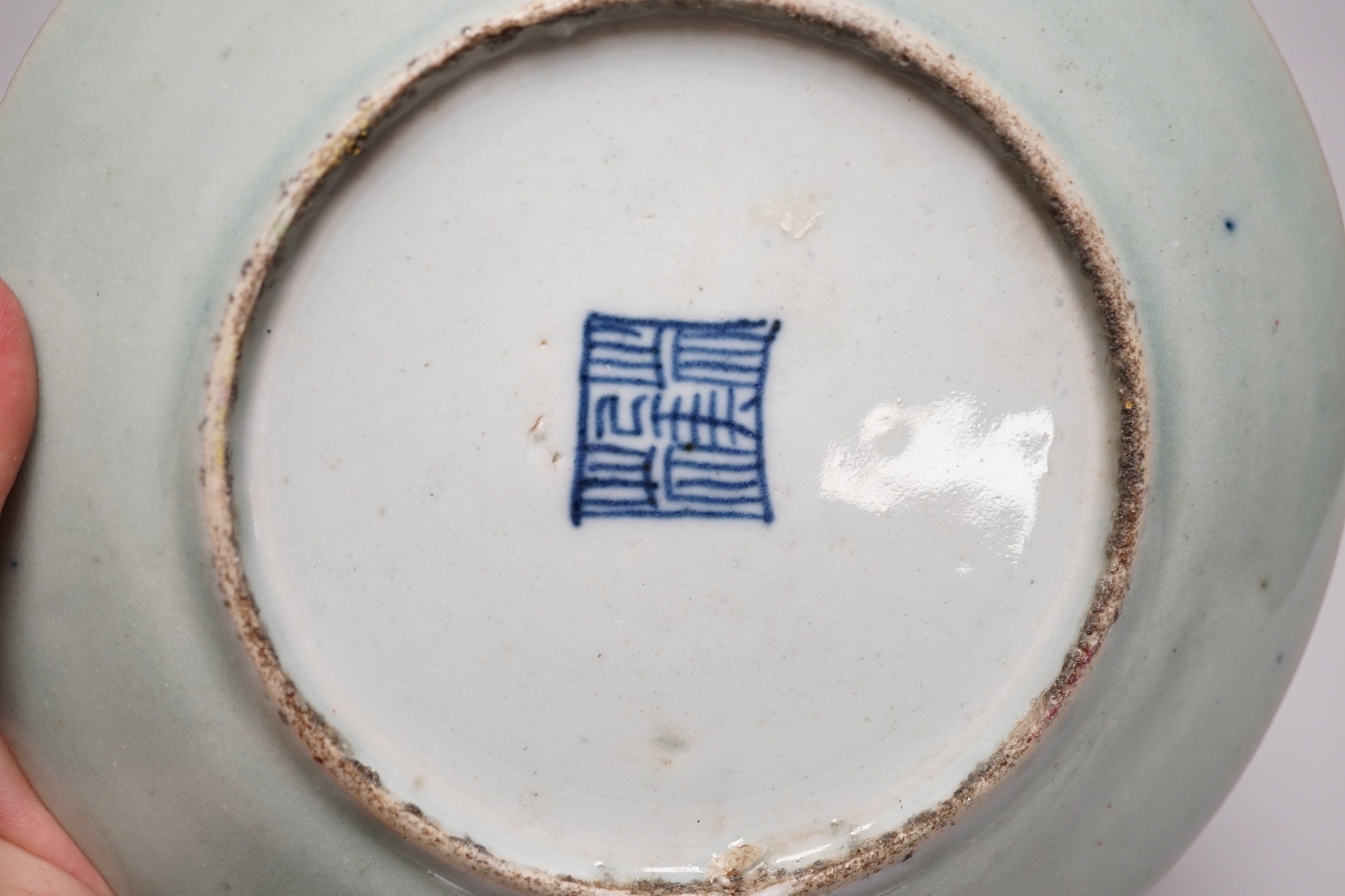 Five 19th century Chinese celadon glazed famille rose dishes, largest 23.5 cm